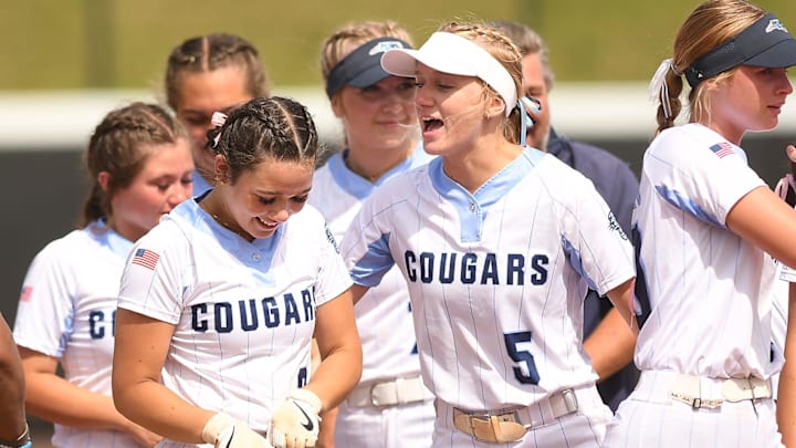 South Brunswick's #3 Tabatha Martins and #5 Gracin Johnson celebrate after they beat Kings Mountain 2-1 in the 3A softball state championship game at Duke's Jack Katz Stadium Durham, North Carolina. The softball team claimed its first state championship in program history by sweeping Kings Mountain on June 1, 2024. KEN BLEVINS/STARNEWS
