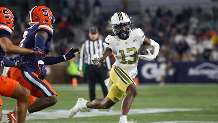 Nov 18, 2023; Atlanta, Georgia, USA; Georgia Tech Yellow Jackets wide receiver Eric Singleton Jr. (13) runs after a catch against the Syracuse Orange in the first half at Bobby Dodd Stadium at Hyundai Field. Mandatory Credit: Brett Davis-Imagn Images
