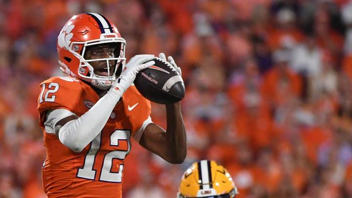 Clemson Tigers wide receiver Bryant Wesco Jr. (12) catches a pass while being defended by LSU Tigers cornerback PJ Woodland (11) Saturday, Aug. 30, 2025 during the NCAA football game at Memorial Stadium in Clemson, South Carolina. LSU Tigers won 17-10.