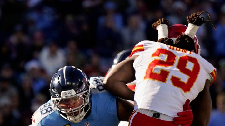 Tennessee Titans defensive tackle Jeffery Simmons (98) tackles Kansas City Chiefs running back Kareem Hunt (29) for a safety during the second quarter at Nissan Stadium in Nashville, Tenn., Sunday, Dec. 21, 2025.