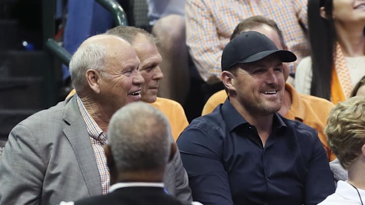Mar 17, 2018; Dallas, TX, USA; Tennessee Volunteers former head football coach Phillip Fullmer sits with Dallas Cowboys tight end Jason Witten during the first half against the Loyola (Il) Ramblers in the second round of the 2018 NCAA Tournament at American Airlines Center. Mandatory Credit: Tim Heitman-Imagn Images