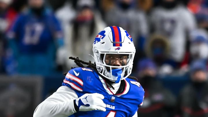 Jan 21, 2024; Orchard Park, New York, USA; Buffalo Bills running back James Cook (4) carries the ball against the Kansas City Chiefs in the first half of a 2024 AFC divisional round game at Highmark Stadium. Mandatory Credit: Mark Konezny-USA TODAY Sports