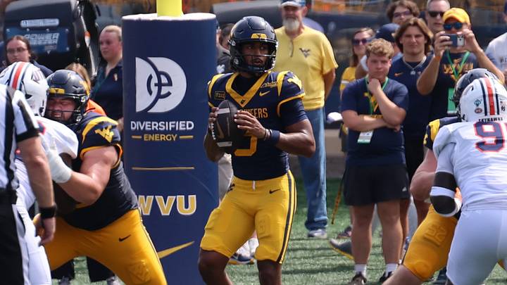 West Virginia University quarterback Michael Hawkins Jr. West Virginia University quarterback Michael Hawkins Jr.