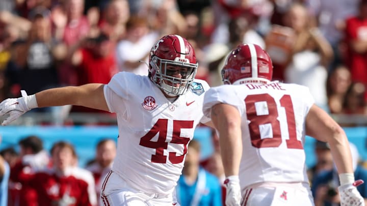 Dec 31, 2024; Tampa, FL, USA; Alabama Crimson Tide tight end Robbie Ouzts (45) celebrates with tight end CJ Dippre (81) after scoring a touchdown against the Michigan Wolverines in the second quarter during the ReliaQuest Bowl at Raymond James Stadium. Dec 31, 2024; Tampa, FL, USA; Alabama Crimson Tide tight end Robbie Ouzts (45) celebrates with tight end CJ Dippre (81) after scoring a touchdown against the Michigan Wolverines in the second quarter during the ReliaQuest Bowl at Raymond James Stadium.