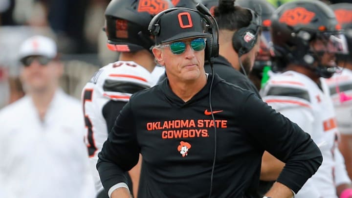Oklahoma State interim football coach Doug Meacham walks the sideline in a Big 12 game against Texas Tech on Saturday, Oct. 25, 2025, at Jones AT&T Stadium.