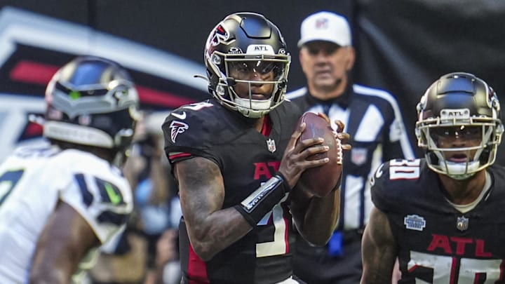 Former Husky quarterback Michael Penix Jr. is shown in his NFL debut against the Seahawks and he played again against Denver.