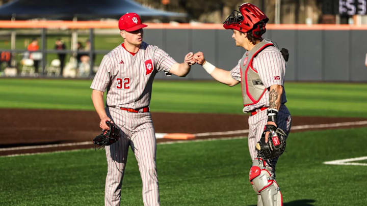 Indiana pitcher Cole Gilley and catcher Jake Stadler bump fists. Gilley's pitching effort helped the Hoosiers win Saturday's game against Illinois, but the Hoosiers were beaten in the other two games. Indiana pitcher Cole Gilley and catcher Jake Stadler bump fists. Gilley's pitching effort helped the Hoosiers win Saturday's game against Illinois, but the Hoosiers were beaten in the other two games.