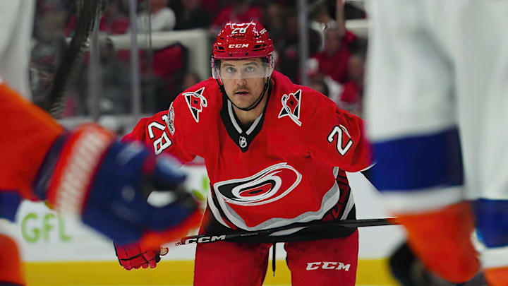 Apr 25, 2023; Raleigh, North Carolina, USA; Carolina Hurricanes left wing Mackenzie MacEachern (28) looks on against the New York Islanders during the third period in game five of the first round of the 2023 Stanley Cup Playoffs at PNC Arena. Mandatory Credit: James Guillory-Imagn Images
