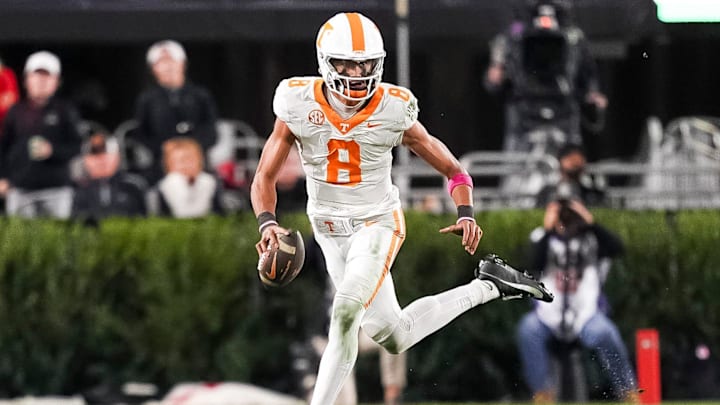 Tennessee quarterback Nico Iamaleava (8) runs with the ball during a college football game between Tennessee and Georgia at Sanford Stadium in Athens, Ga., on Saturday, November 16, 2024.