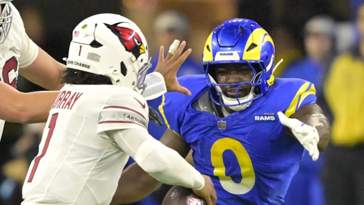 Dec 28, 2024; Inglewood, California, USA;   Los Angeles Rams linebacker Byron Young (0) pressures Arizona Cardinals quarterback Kyler Murray (1) at SoFi Stadium. Mandatory Credit: Jayne Kamin-Oncea-Imagn Images