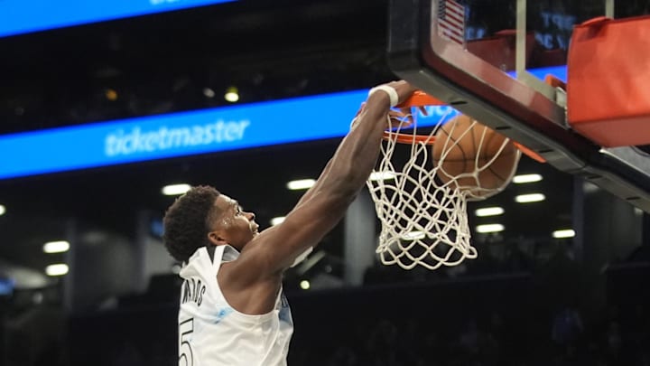 Apr 3, 2025; Brooklyn, New York, USA; Minnesota Timberwolves shooting guard Anthony Edwards (5) dunks the ball against the Brooklyn Nets during the second half at Barclays Center. Mandatory Credit: Gregory Fisher-Imagn Images