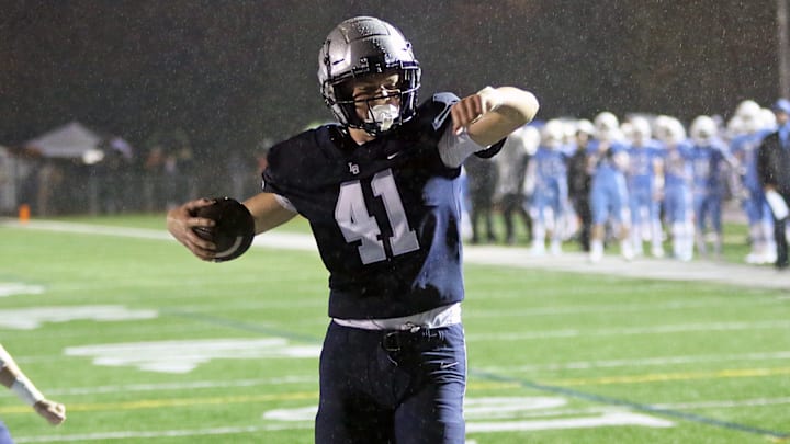 Ethan Uecker had a five-yard touchdown catch for Lake Oswego late in the second quarter of the Lakers' rivalry win against Lakeridge on Friday at Lake Oswego High School.
