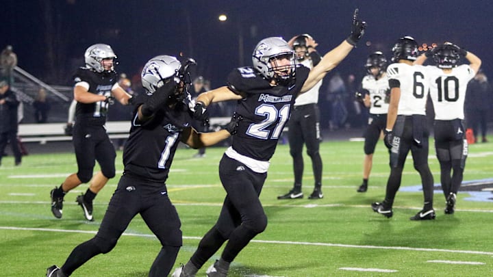 The Mountainside Mavericks celebrate after their 44-39 win over the Tualatin Timberwolves in the first round of the 6A Open playoffs. Mountainside will face top-seeded Lake Oswego next week.