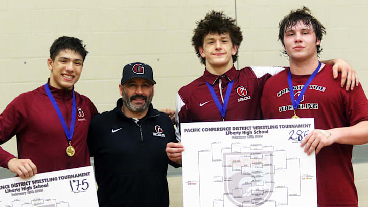 From left: Isaac Reynoso, Glencoe head coach Jason Harless, Camden Roofener and Brody Sahlfeld