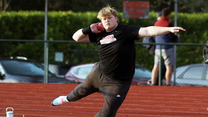 Lincoln senior Brady Holland gets ready to throw the shot put during the Cardinals’ Portland Interscholastic League dual meet at Wells. Lincoln senior Brady Holland gets ready to throw the shot put during the Cardinals’ Portland Interscholastic League dual meet at Wells.