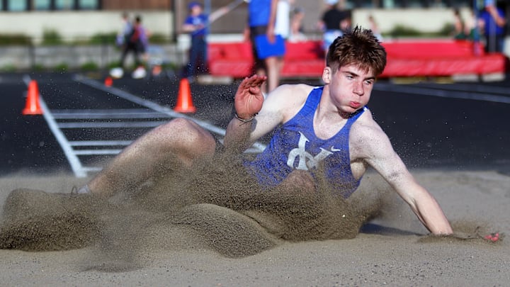 Valley Catholic senior Drew Klopcic lands in the pit during the triple jump competition in last week’s meet at Valley Catholic. Klopcic triumphed with a mark of 44 feet, 8 inches.