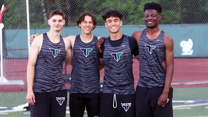 Tigard’s (from left) Daniel Rotaru, Micah Gerhard, Brayden Nee and Marcus Burton are part of deep group of Tigers sprinters who have shined in relay races this season.
