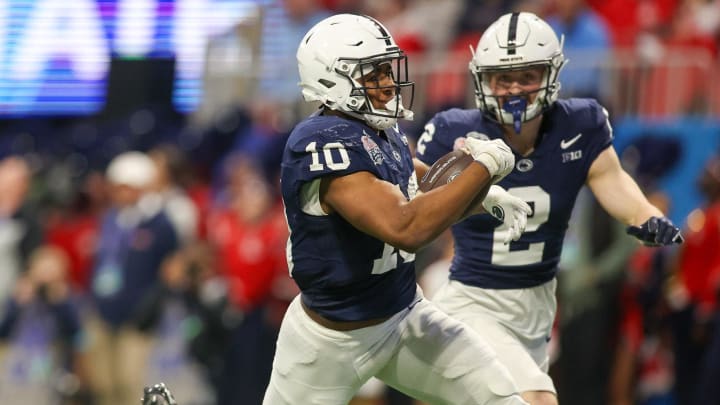 Penn State running back Nicholas Singleton catches a touchdown pass against Ole Miss in the Peach Bowl. Penn State running back Nicholas Singleton catches a touchdown pass against Ole Miss in the Peach Bowl.