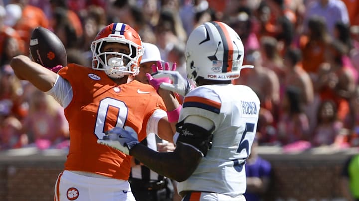 Oct 19, 2024; Clemson, South Carolina, USA; Clemson Tigers wide receiver Antonio Williams (0) makes a pass against the Virgina Cavaliers at Memorial Stadium. Mandatory Credit: Alexander Hicks-Imagn Images