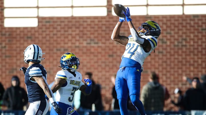 Delaware defensive back Tyron Herring makes an interception late in the second quarter, setting up the Hens' third touchdown against Villanova at Villanova Stadium, Saturday, Nov. 23, 2024.