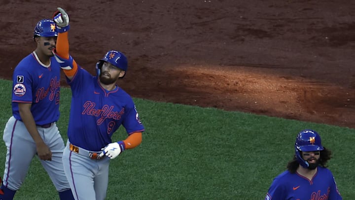 Apr 28, 2025; Washington, District of Columbia, USA; New York Mets outfielder Brandon Nimmo (9) celebrates with Mets outfielder Jesse Winker (3) and Mets third base Mark Vientos (27) after hitting a three run home run against the Washington Nationals during the sixth inning at Nationals Park. Mandatory Credit: Geoff Burke-Imagn Images Apr 28, 2025; Washington, District of Columbia, USA; New York Mets outfielder Brandon Nimmo (9) celebrates with Mets outfielder Jesse Winker (3) and Mets third base Mark Vientos (27) after hitting a three run home run against the Washington Nationals during the sixth inning at Nationals Park. Mandatory Credit: Geoff Burke-Imagn Images