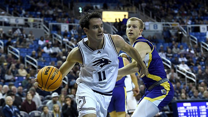 Nevada’s Nick Davidson looks to pass while taking on South Dakota State at Lawlor Events Center in Reno on Dec. 11, 2024.