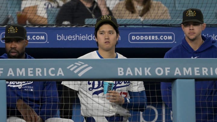 May 18, 2024; Los Angeles, California, USA; Los Angeles Dodgers designated hitter Shohei Ohtani (17) looks on from the dugout in the ninth inning against the Cincinnati Reds at Dodger Stadium. Mandatory Credit: Jayne Kamin-Oncea-USA TODAY Sports