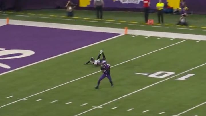 Jordan Addison catches a ball after a defender dives nowhere near him. Jordan Addison catches a ball after a defender dives nowhere near him.