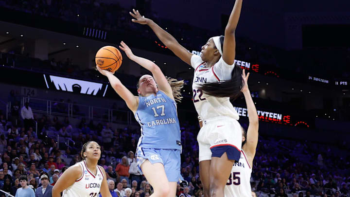 Mar 27, 2026; Fort Worth, TX, USA; North Carolina Tar Heels guard Elina Aarnisalo (17) scores a basket against UConn Huskies forward Serah Williams (22) during the second half at Dickies Arena. Mandatory Credit: Chris Jones-Imagn Images Mar 27, 2026; Fort Worth, TX, USA; North Carolina Tar Heels guard Elina Aarnisalo (17) scores a basket against UConn Huskies forward Serah Williams (22) during the second half at Dickies Arena. Mandatory Credit: Chris Jones-Imagn Images