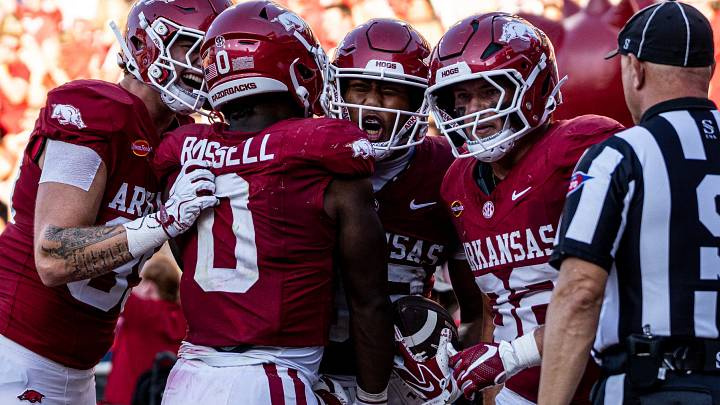 Arkansas Razorbacks offensive players celebrate a touchdown in the second half against Tennessee. Arkansas Razorbacks offensive players celebrate a touchdown in the second half against Tennessee.
