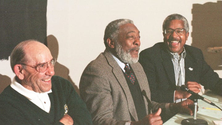 February 22, 1999; Montclair, NJ, USA; Left to right: Yogi Berra, Bill White, and Ron Burton get a laugh together as they discuss their professional sports careers. White played first base for the New York Giants and the St. Louis Cardinals.  Burton, a Montclair native, played football for the Dallas Cowboys. Both were guests of Berra's at his Montclair Museum, in Montclair, N.J., on Monday, February 22, 1999, in celebration of black history month. Mandatory Credit: David F. Adornato-USA TODAY
