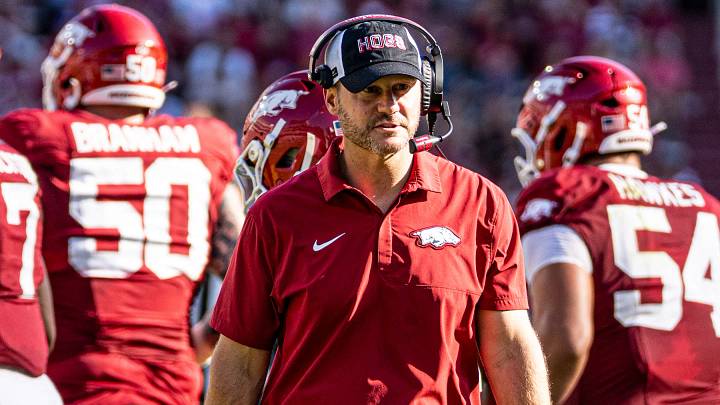 Arkansas Razorbacks coach Ryan SIlverfield watches his offense return to the sideline after a punt in the first half. Arkansas Razorbacks coach Ryan SIlverfield watches his offense return to the sideline after a punt in the first half.