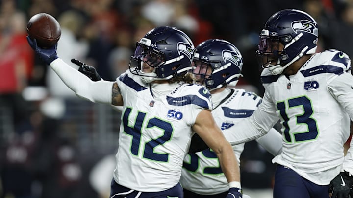 Jan 3, 2026; Santa Clara, California, USA; Seattle Seahawks linebacker Drake Thomas (42) reacts after an interception against the San Francisco 49ers during the second half at Levi's Stadium. Jan 3, 2026; Santa Clara, California, USA; Seattle Seahawks linebacker Drake Thomas (42) reacts after an interception against the San Francisco 49ers during the second half at Levi's Stadium.