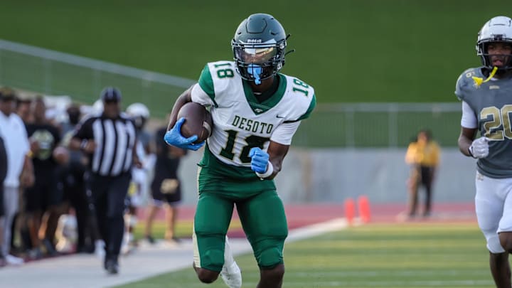 DeSoto four-star receiver Ethan "Boobie" Feaster races toward the endzone for a long-haul touchdown as a freshman in 2023. | Photo by Robbie Rakestraw, SBLive DeSoto four-star receiver Ethan "Boobie" Feaster races toward the endzone for a long-haul touchdown as a freshman in 2023. | Photo by Robbie Rakestraw, SBLive