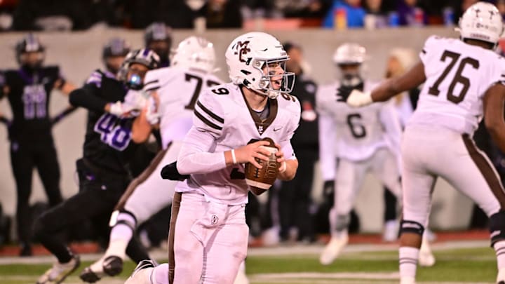 Chicago Mt. Carmel QB Jack Elliott (Vanderbilt commit) leads the Caravan offense with his arm and his legs. Chicago Mt. Carmel QB Jack Elliott (Vanderbilt commit) leads the Caravan offense with his arm and his legs.