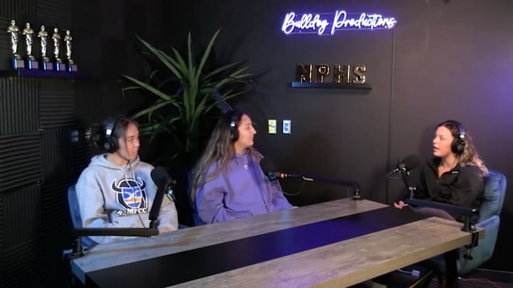 Kindy Sproat (left) and Gigi Rivas (center) interview North Platte girls wrestling assistant coach and former state champion, Ambie Custard for Episode 3 of On The Air: A Wrestling Podcast. 