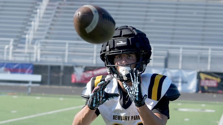 Shane Rosenthal catches a pass during a Newbury Park High football practice on Friday, Aug. 16, 2024. Rosenthal led the state in receptions (122), receiving yardage (1,948) and interceptions (12) in his junior season. Shane Rosenthal catches a pass during a Newbury Park High football practice on Friday, Aug. 16, 2024. Rosenthal led the state in receptions (122), receiving yardage (1,948) and interceptions (12) in his junior season.