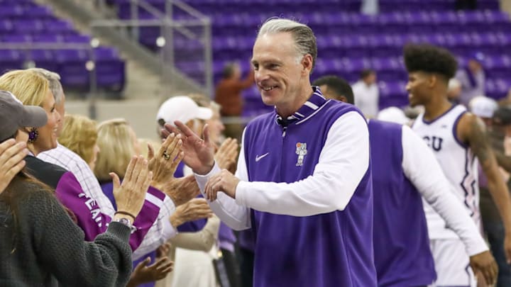 TCU men's basketball head coach Jamie Dixon celebrates his 500th career head coaching victory with a win over West Virginia on Wednesday, February 5th, 2025. TCU men's basketball head coach Jamie Dixon celebrates his 500th career head coaching victory with a win over West Virginia on Wednesday, February 5th, 2025.