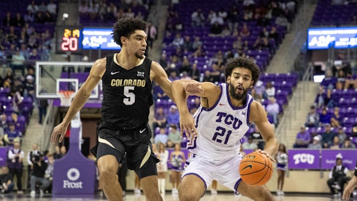 Noah Reynolds drive the ball for TCU men's basketball vs. Colorado on Sunday, February 5, 2025.