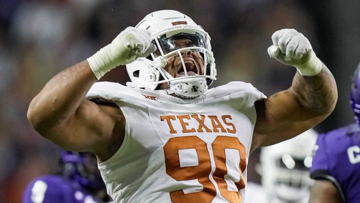 Texas defensive lineman Byron Murphy II celebrates after sacking TCU quarterback Josh Hoover