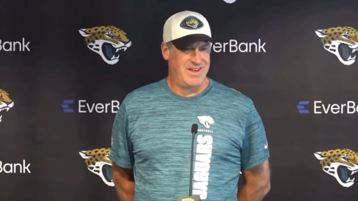 Pederson gives an awkward smile when asked about changing play callers.