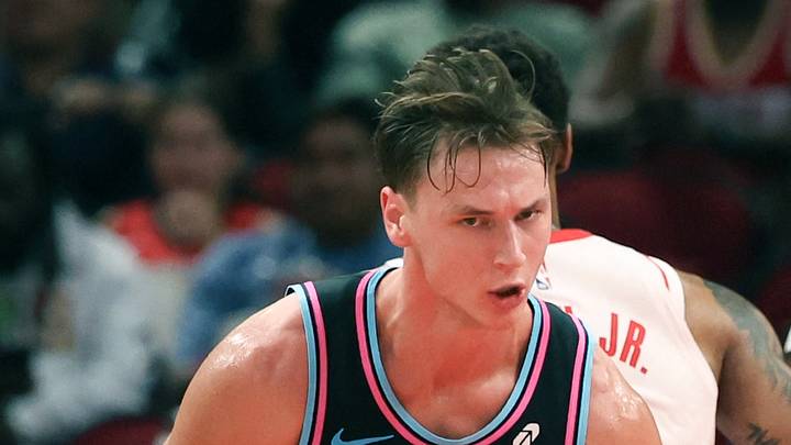 Mar 21, 2026; Houston, Texas, USA;  Miami Heat guard Pelle Larsson (9) reacts after dunking against the Houston Rockets in the first half at Toyota Center. Mandatory Credit: Thomas Shea-Imagn Images