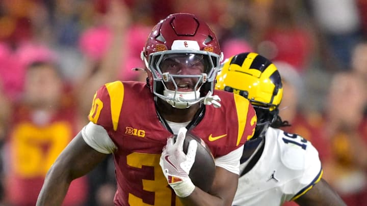Oct 11, 2025; Los Angeles, California, USA; USC Trojans running back King Miller (30) runs to the 19-yard line in the second half against the Michigan Wolverines at United Airlines Field at the Los Angeles Memorial Coliseum. Mandatory Credit: Jayne Kamin-Oncea-Imagn Images