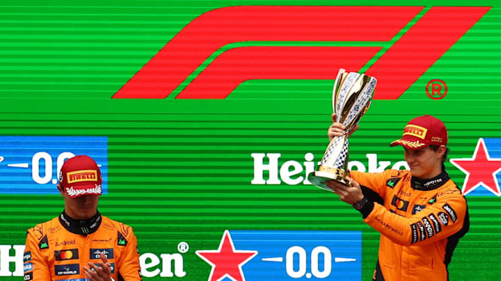 [US, Mexico & Canada customers only] March 23, 2025; Shanghai, CHINA; Oscar Piastri celebrates next to Lando Norris after winning the F1 Chinese Grand Prix at Shanghai International Circuit. Mandatory Credit: Go Nakamura/Reuters via Imagn Images