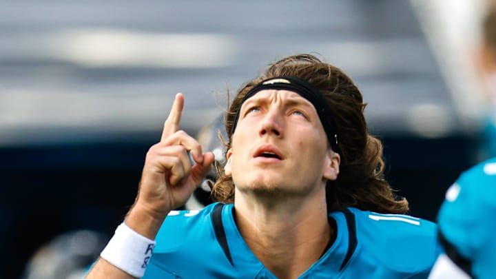 Jacksonville Jaguars quarterback Trevor Lawrence (16) runs onto the field before the start of an NFL football AFC Wild Card playoff matchup, Sunday, Jan. 11, 2026, in Jacksonville, Fla. Bills lead 10-7 at the half over the Jaguars. 