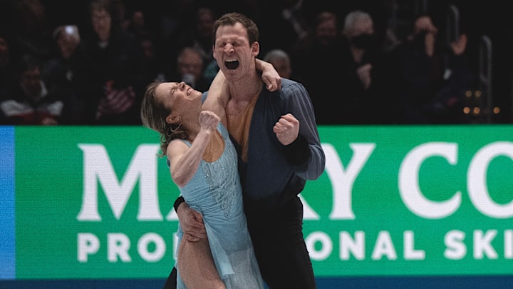 U.S. figure skaters Alisa Efimova and Misha Mitrofanov celebrate their performance at the TD Garden in Boston.