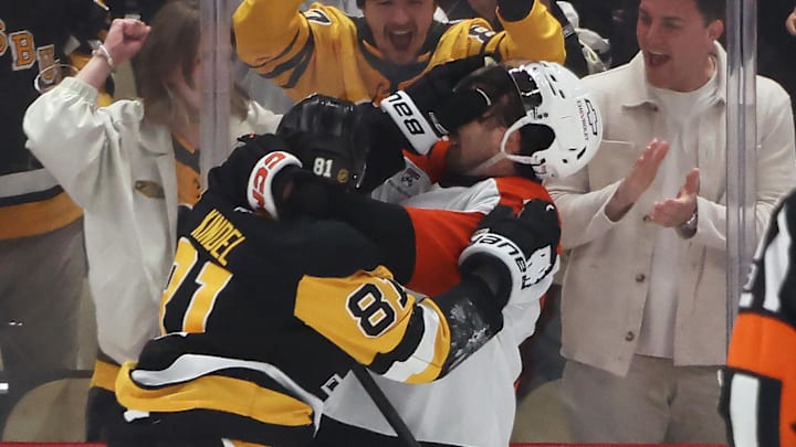Mar 7, 2026; Pittsburgh, Pennsylvania, USA;  Pittsburgh Penguins center Ben Kindel (81) and Philadelphia Flyers left wing Noah Cates (27) scrap during the first period at PPG Paints Arena. Mandatory Credit: Charles LeClaire-Imagn Images