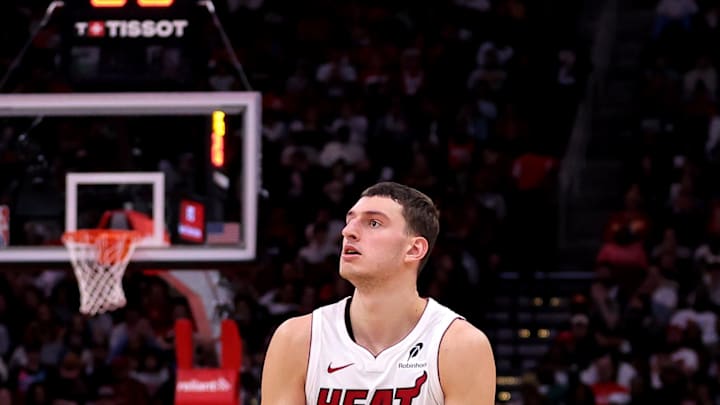 Dec 29, 2024; Houston, Texas, USA; Miami Heat forward Nikola Jovic (5) shoots outside against the Houston Rockets during the third quarter at Toyota Center. Mandatory Credit: Erik Williams-Imagn Images
