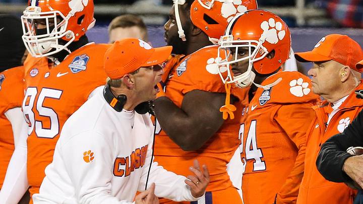 Dec 5, 2015; Charlotte, NC, USA; Clemson Tigers head coach Dabo Swinney (C) yells at defensive back Mark Fields (24) after a personal foul penalty during the fourth quarter in the ACC football championship game at Bank of America Stadium. The Tigers won 45-37. Mandatory Credit: Jim Dedmon-Imagn Images Dec 5, 2015; Charlotte, NC, USA; Clemson Tigers head coach Dabo Swinney (C) yells at defensive back Mark Fields (24) after a personal foul penalty during the fourth quarter in the ACC football championship game at Bank of America Stadium. The Tigers won 45-37. Mandatory Credit: Jim Dedmon-Imagn Images