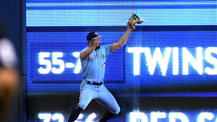 Toronto Blue Jays center fielder Randal Grichuk (15) plays for a ball hit for an RBI double by Chicago White Sox catcher Seby Zavala (not shown) in the sixth inning at Rogers Centre in 2021.
